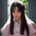 数据分析师陈思琪头像，扎马尾的女性，数据大屏背景